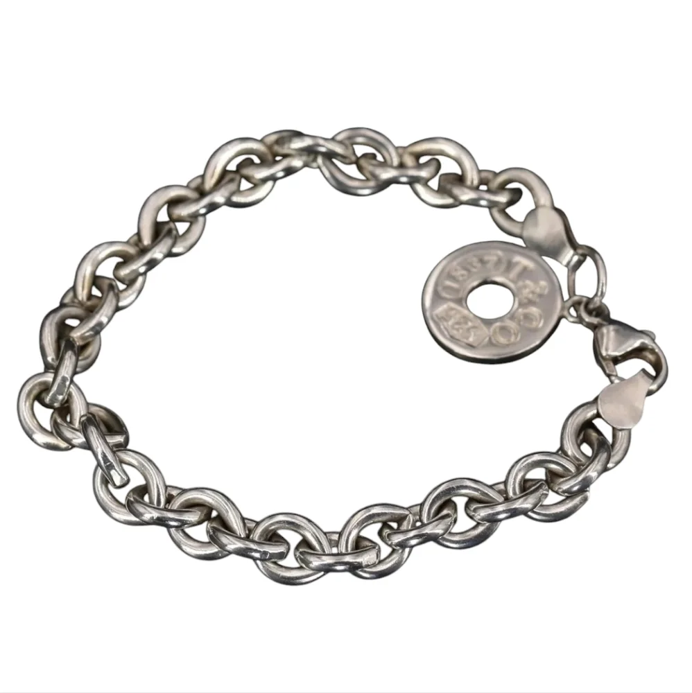 Authentic Tiffany and Co. Sterling Silver Charm Bracelet! - Picture 3 of 14